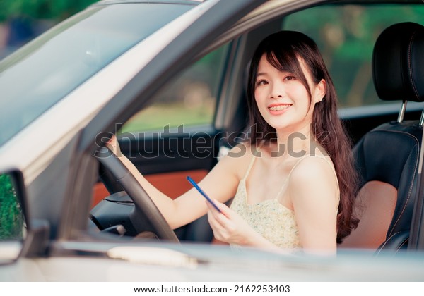 Female\
drivers on the car, self-drive travel\
concept