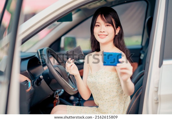 Female\
drivers on the car, self-drive travel\
concept