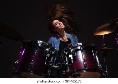 Female Drummer Playing The Drums