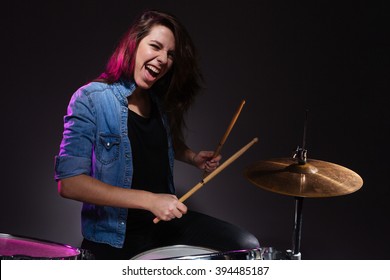 Female Drummer Playing The Drums