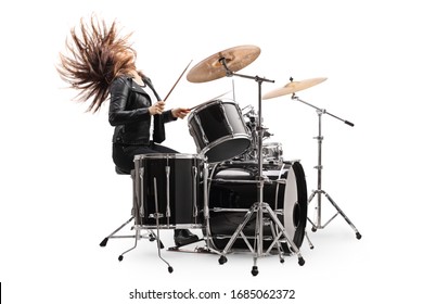 Female drummer playing the drums and throwing hair back isolated on white background
