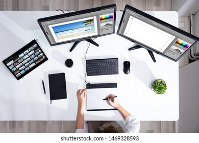 Female Editor Working With Photos On Computer - Powered by Shutterstock