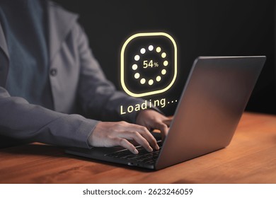 Female employee types on a laptop with a floating Loading... progress bar, representing data processing or digital wait time in a modern tech environment, anticipation of technology responding.