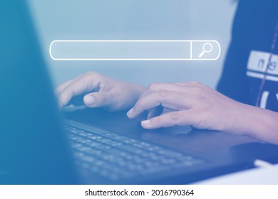 A female employee uses a laptop computer to find useful information at work. Financial concepts, business, job hunting. - Shutterstock ID 2016790364