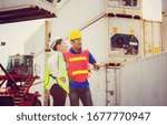 Female engineer checking containers box with worker man from cargo