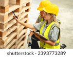 Female engineer using laptop computer for safety control checks or manufacturing maintenance work in factory building or construction site. woman engineer inspector working in industry product line