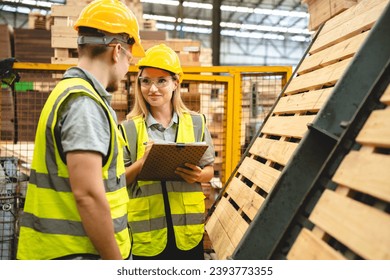 Female engineer using laptop computer for safety control checks or manufacturing maintenance work in factory building or construction site. woman engineer inspector working in industry product line