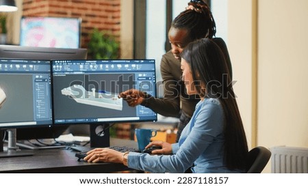 Female engineers analyzing clamp component prototype, working with industrial 3d software. Team of mechanical developers creating engine product for machinery production, creative asset.