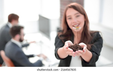 Female Environmentalist Showing Fresh Sprout