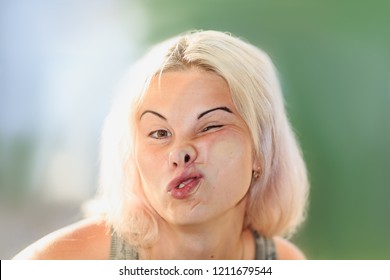 Female Face Pressed Against Glass Or Window, Funny Female Face Expression