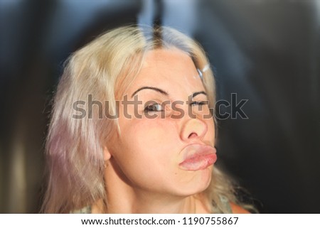 female face pressed against glass or window,  funny female face expression