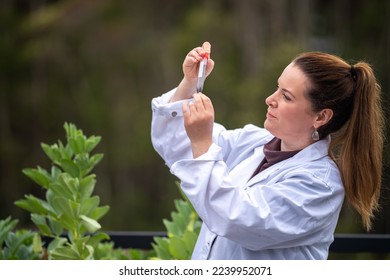 female farmer scientist researching plants and agricultural research in australia - Powered by Shutterstock