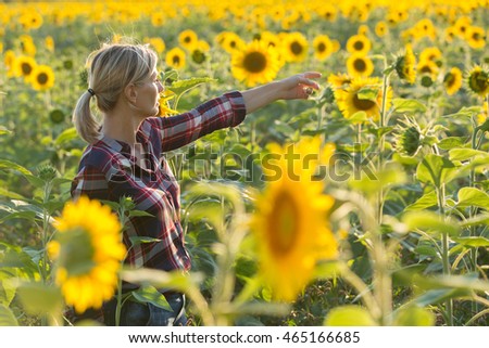 female farmer in sunflower field