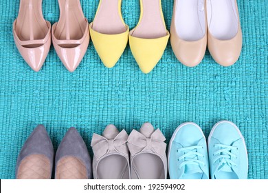 Female Fashion Shoes On Blue Carpet 