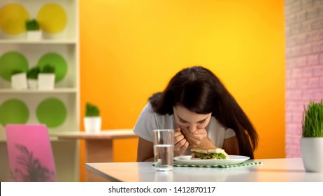 Female Feeling Nausea Sitting Canteen Table, Junk Meal Poisoning, Food Quality