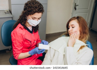 Female Feeling Painful Toothache. Teeth Problem Woman Feeling Tooth Pain. Social Medicine, Budget Dental Clinic In Poor Countries. Dentists Are Working.