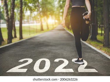 Female Feet In Sneakers At The Start. Beginning And Start Of The New Year 2022, Goals And Plans For The Next Year