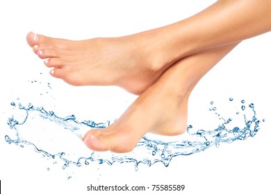 Female feet and water. Spa massage. Hygiene.