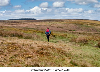 Female Fell Runner On Ilkley Moor, West Yorkshire