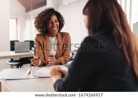 Female financial advisor consulting a client