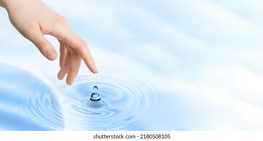 Female finger touching the water surface level. Skin cleansing micellar water concept - Shutterstock ID 2180508105