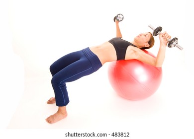 A Female Fitness Instructor Demonstrates The Starting Position Of The Fitball Dumbell Press