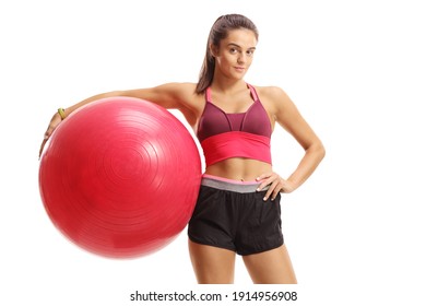 Female Fitness Model Posing With An Exercise Ball Isolated On White Background