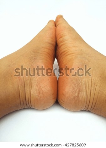 Female foot on white background 