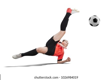 Female Football Player In Orange Uniform Making Bicycle Kick Isolated