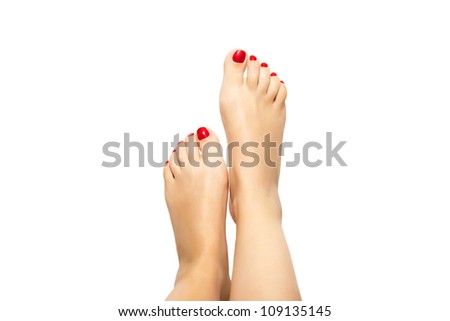 Female foots with an pedicure on a white background