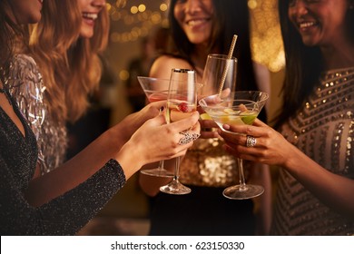 Female Friends Make Toast As They Celebrate At Party