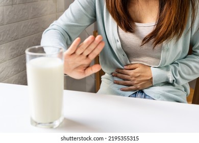 Female Gesturing Stop Or Say No To Drink Milk. Lactose Intolerance, Food Allergy Concept. Closeup