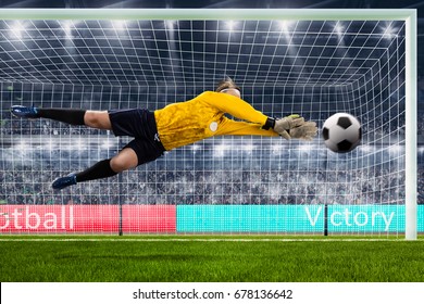 Female Goalie Is Jumping For The Ball On Crowded Stadium