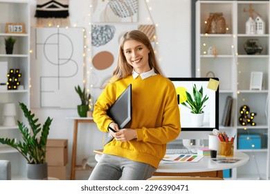 Female graphic designer with tablet in office - Powered by Shutterstock