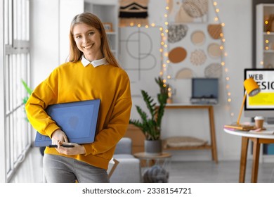 Female graphic designer with tablet in office - Powered by Shutterstock