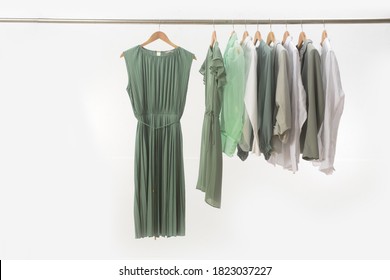 Female And Green Jacket ,suit And Striped Shirt Blouse ,green Dress ,coat Isolated And On Hanger