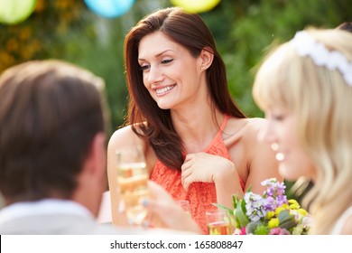 Female Guest At Wedding Reception