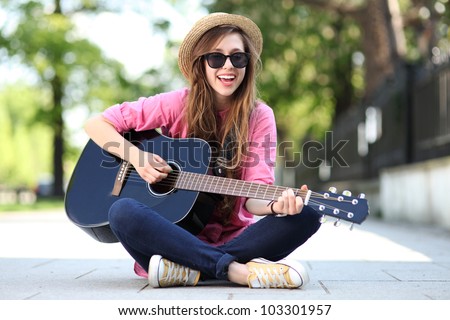 Female with guitar
