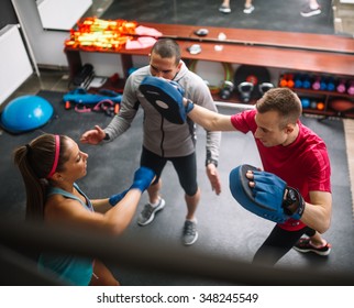 Female At The Gym Doing Cardio Kickboxing