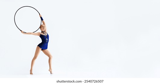 Female gymnast giving performance with hula hoop on white background, space for your text - Powered by Shutterstock