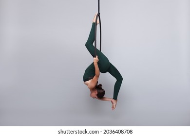 A Female Gymnast On Aerial Hoop