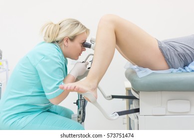 Female Gynecologist During Examination In Her Office