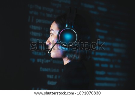 Female hacker cracking the binary code