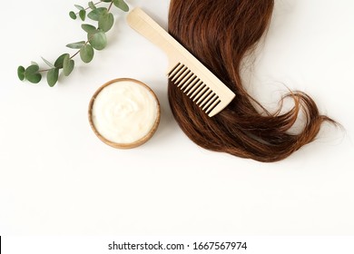 Female Hair, Hair Mask And Bamboo Comb On White Background Top View, Flat Lay. Copy Space. Self Care, Hair Treatment  Concept.