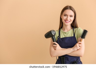 Female hairdresser on color background - Shutterstock ID 1946812975
