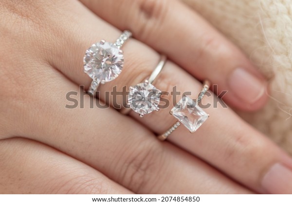 Female hand with\
beautiful jewelry diamond\
ring