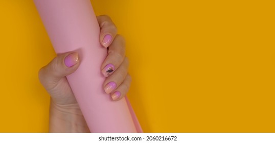female hand beautiful manicure color background