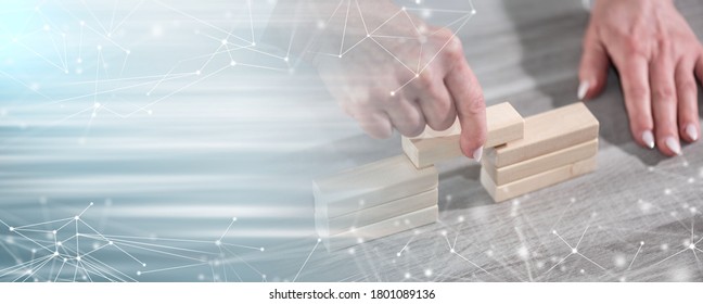 Female Hand Building A Bridge With Wooden Blocks; Concept Of Association; Panoramic Banner
