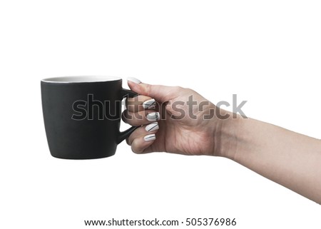 Female hand with cup isolated on white.