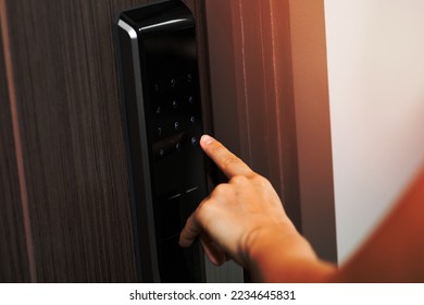 Female hand and digital smart code lock into the modern apartment - Shutterstock ID 2234645831